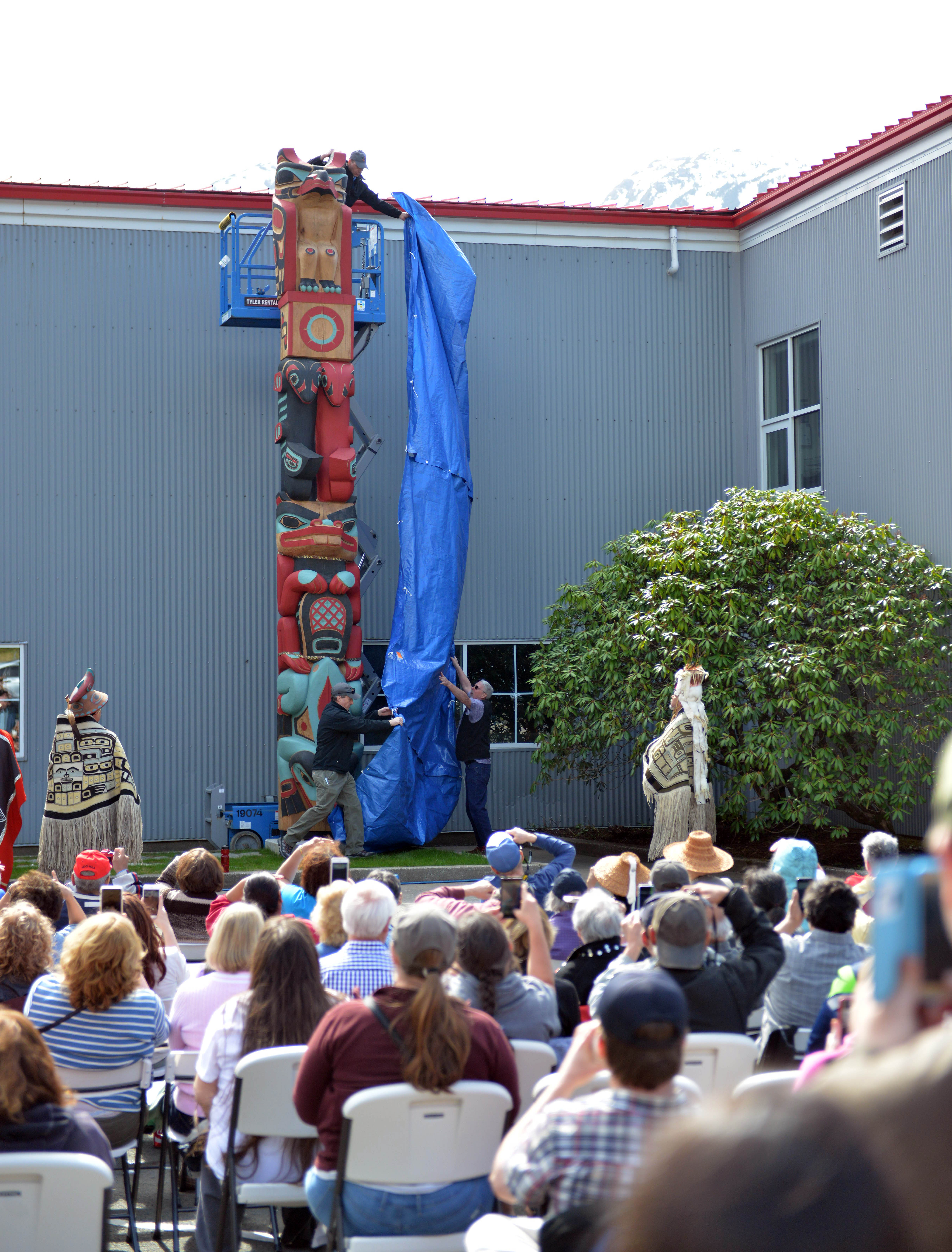 Photos: DIPAC unveils 2 new totem poles at hatchery