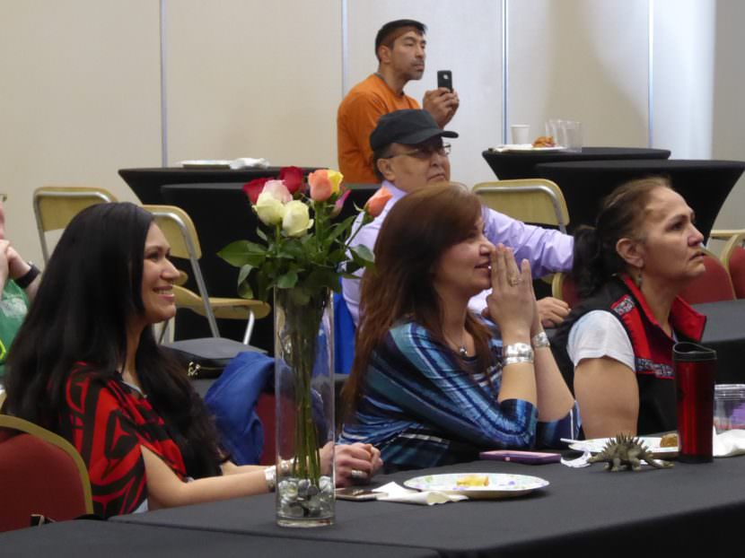 Yolanda Fulmer, left, and other fans watch the Miss USA pageant in anticipation on Sunday. Tommy Gamble pictured in back. (Photo by Quinton Chandler/KTOO)