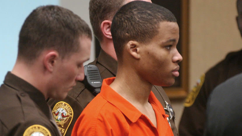 Lee Boyd Malvo attends court proceedings for fellow sniper suspect John Allen Muhammad in 2003. A federal judge has thrown out two sentences of life without parole that Malvo has been serving in Virginia