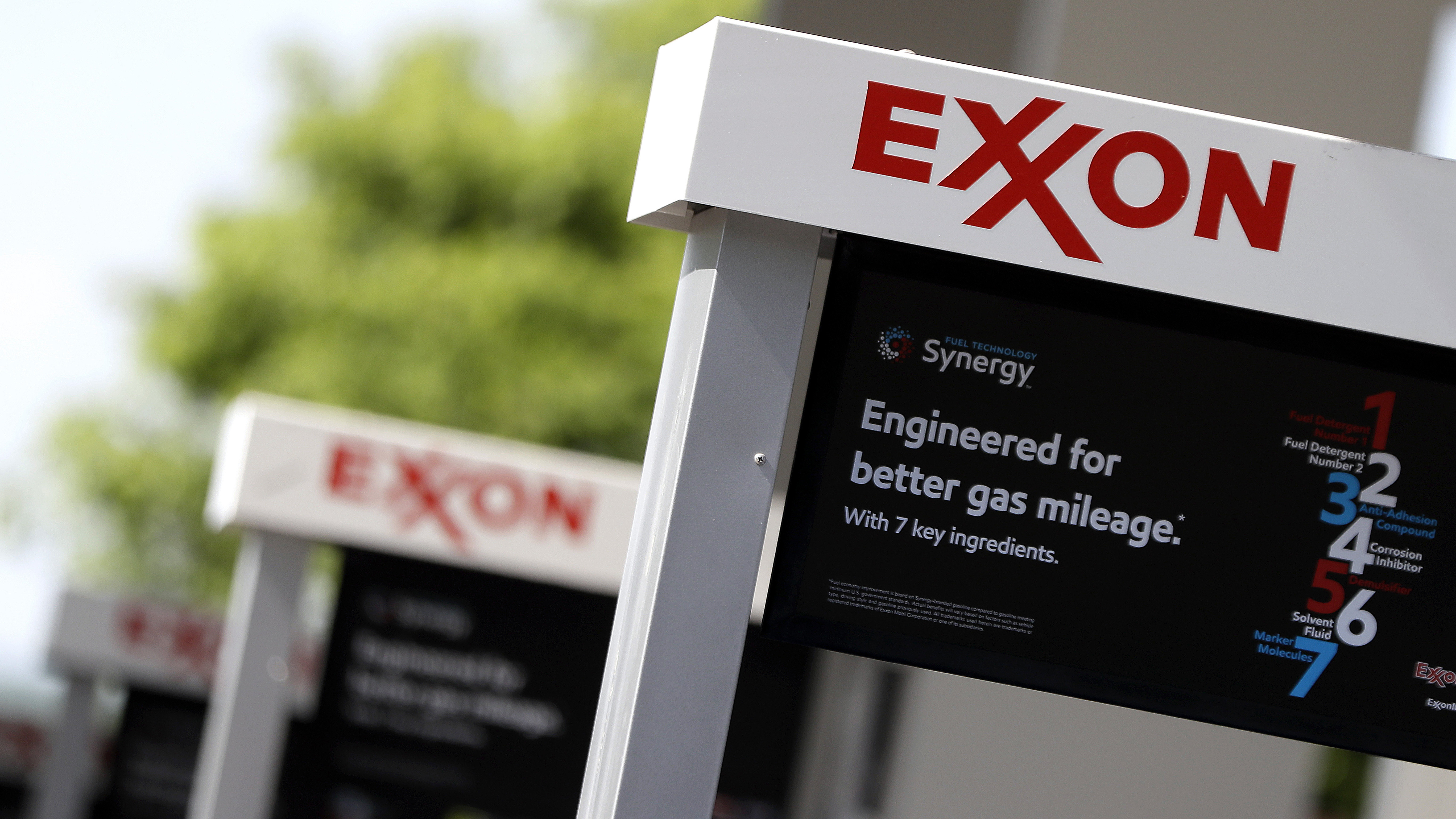 Shareholders push Exxon to disclose business impact of fighting climate change