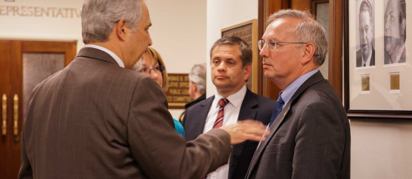 Senate President Pete Kelly and Sen. Anna MacKinnon meet with House Majority Leader Chris Tuck and House Speaker Bryce Edgmon in Juneau on the night of July 15, 2017. Shortly after meeting, the House and Senate adjourned the special session.