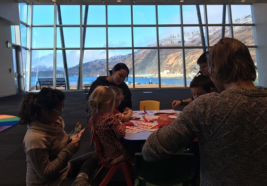 Students and teachers in classroom in the Afognak building on Near Island during pilot semester. (Photo by Kayla Desroches/KMXT)