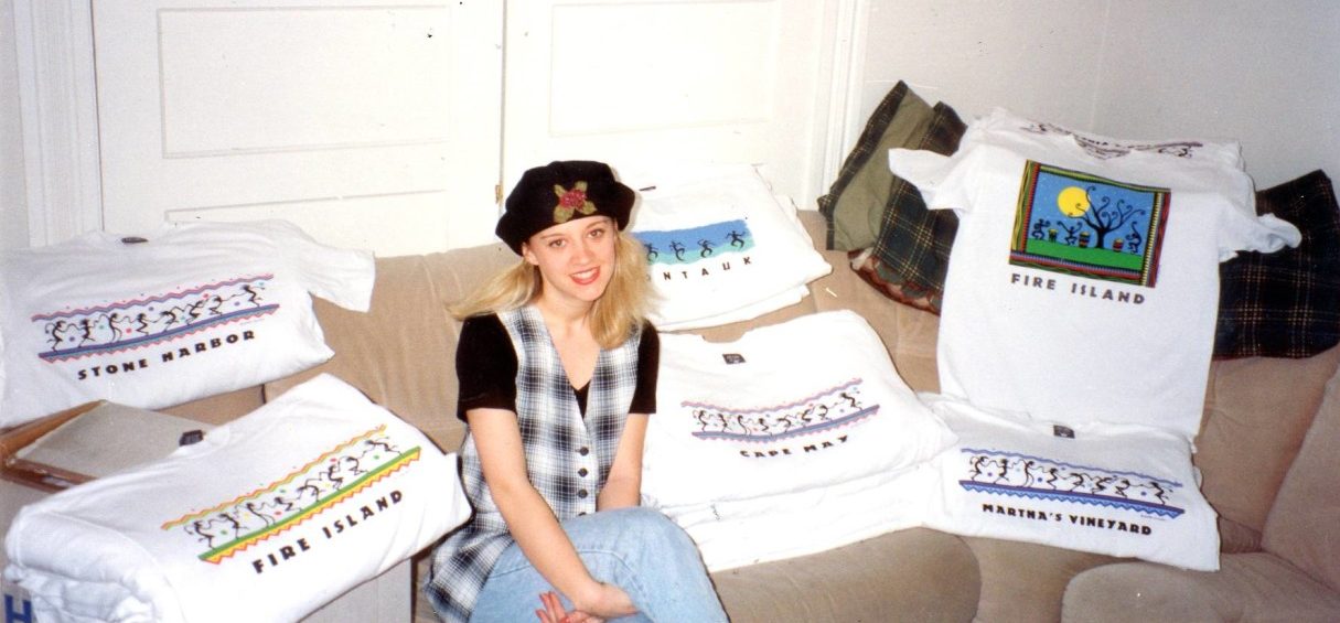 Kerrie sitting with tees