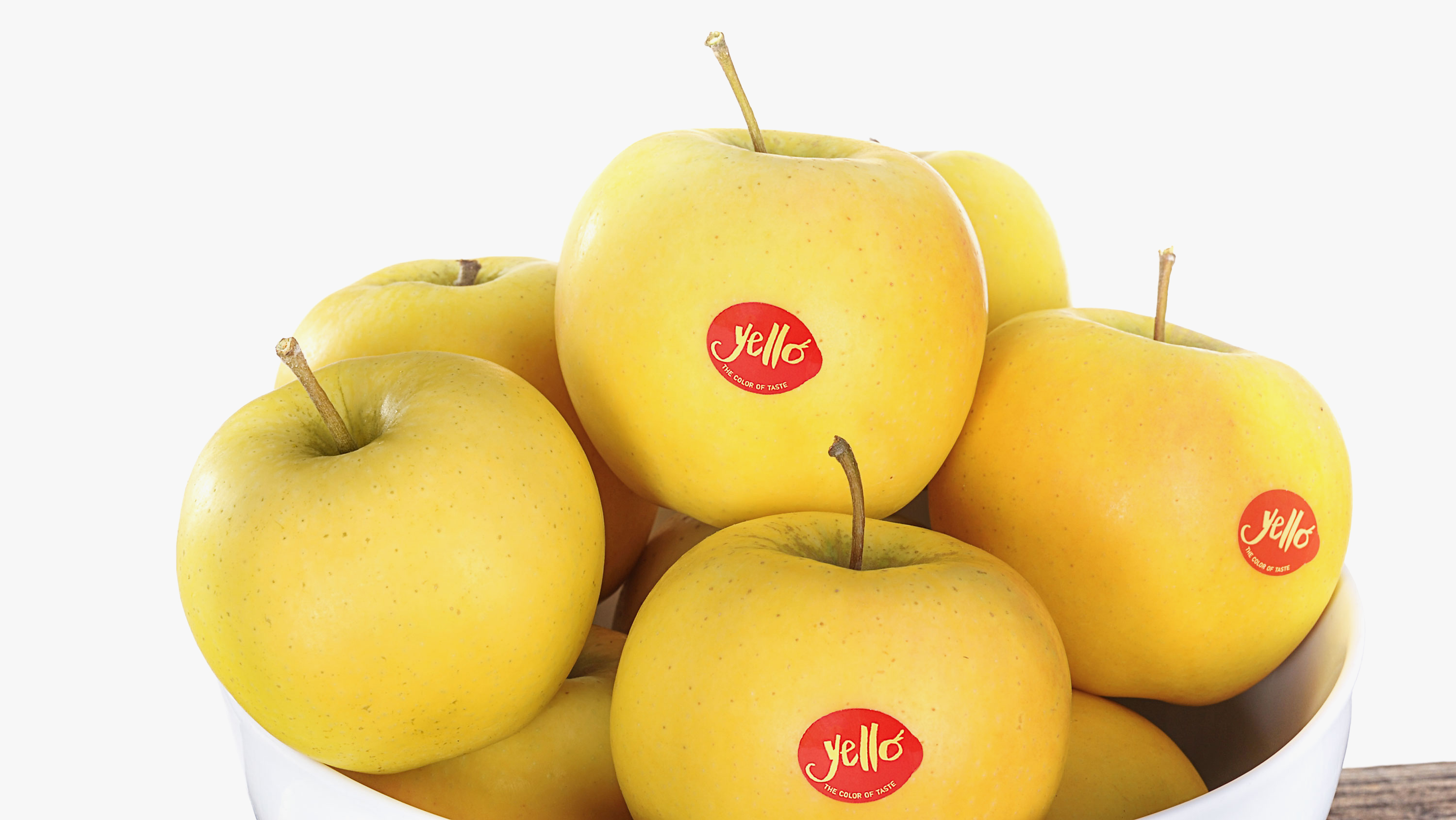 yello apples in a bowl