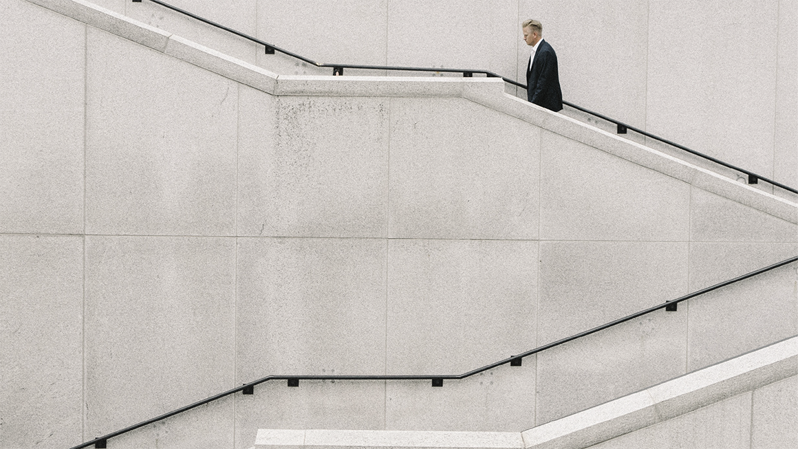 Brand-Led Culture: CEO walking up stairs