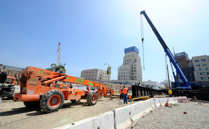 LOS ANGELES, CA - JUNE 3: Metro Purple line decking operation at the intersection of Wilshire/La Brea as part of the Metro Purple Line Extension Project on June 3, 2016 in Los Angeles, California.