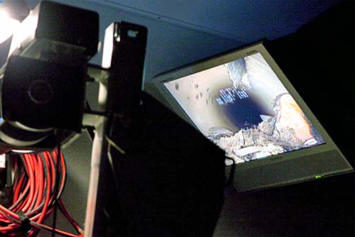 CCTV monitor Tiny closed circuit television (CCTV) camera photographs the drains and see real-time images of debris