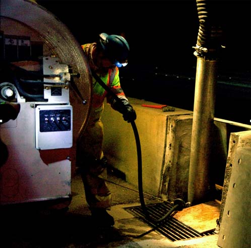 Using high-pressure waterline High-pressure waterline for I-405 drainage system