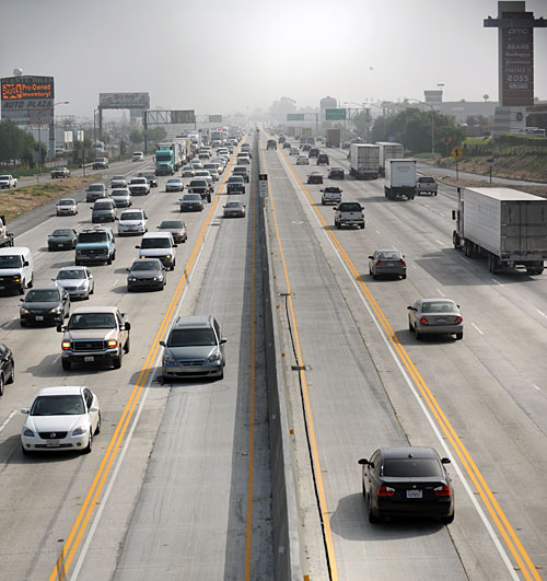 sr60HOV_9252 HOV lanes stretch 11.5 miles in both directions of the Pomona Freeway (SR-60) between the Orange Freeway (SR-57) and the San Gabriel River Freeway (I-605). Photo by Juan Ocampo.