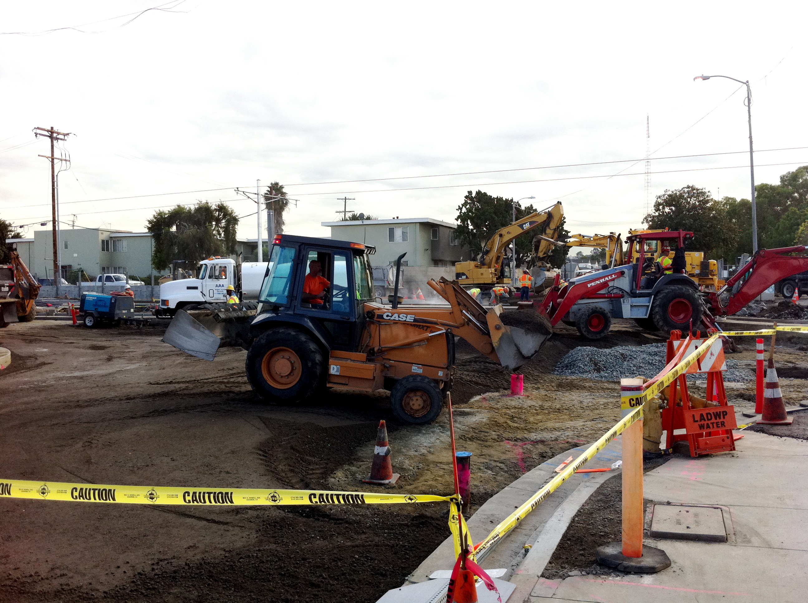 Construction workers rebuild the intersection of Exposition Blvd. and Farmdale Ave. in for the street crossing and station stop. Construction workers rebuild the intersection of Exposition Blvd. and Farmdale Ave. in for the street crossing and station stop.