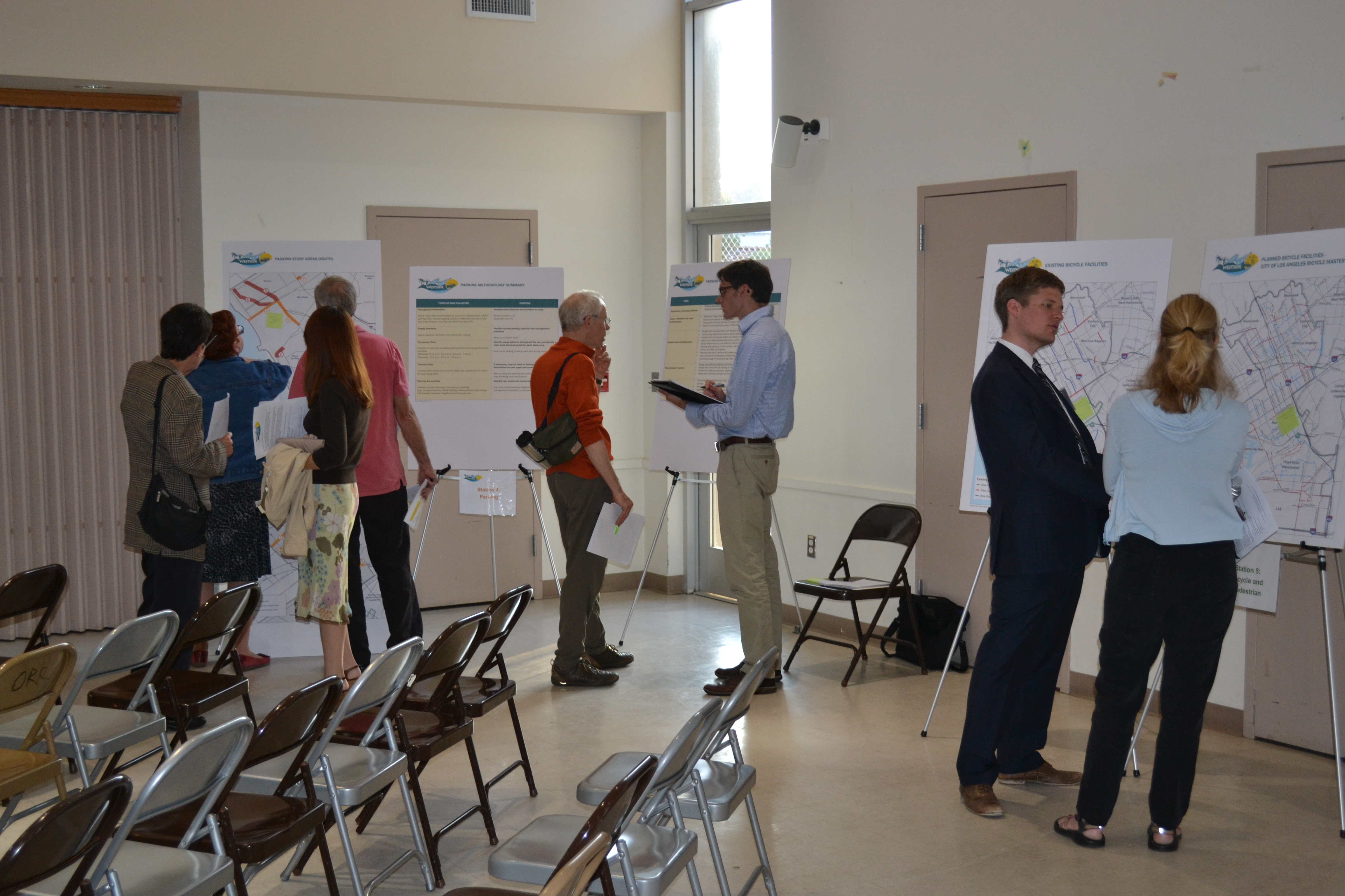Community members perous displays highlighting local mobility issues.
