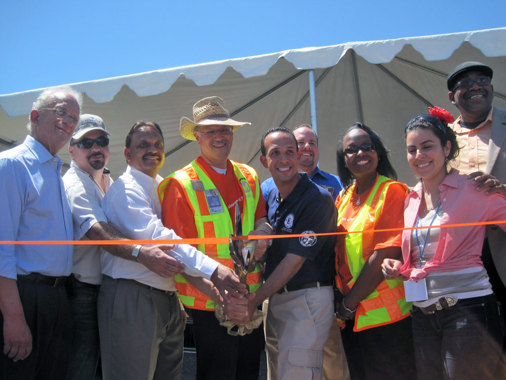 Chatsworth welcome Chatsworth folks staged a ribbon cutting with Los Angeles City Councilman Mitch Englander, center, and Orange Line Transportation Manager Gary Spivack. To Spivack's right is Hitesh Patel, who directed the construction of the Orange Line Extension, and, at far left, is California Congressman Howard Berman. Photo by Dave Sotero.