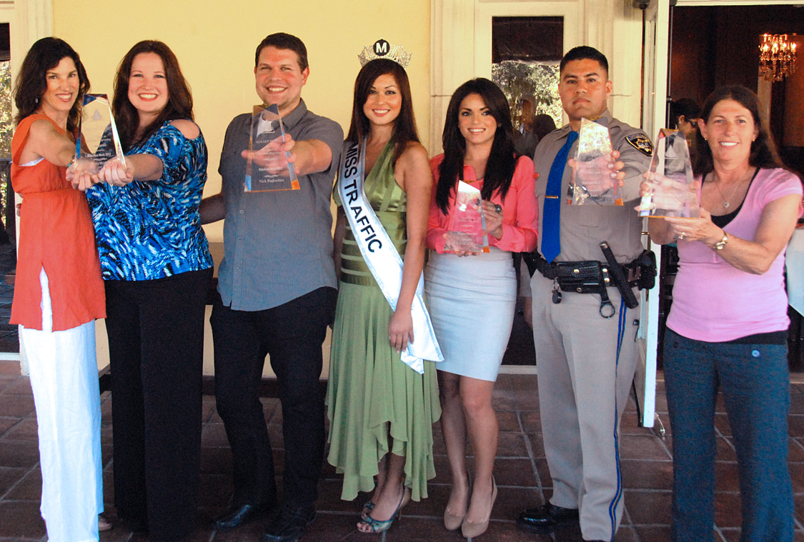 2012 Golden Pylon Awards Winners of the 2012 Golden Pylon Awards: from left, carpooling team of Nora Wells and Sioux-z Jessup report traffic on several radio stations, Total Traffic L.A. powerhouse Nick Pagliochini, Metro's reigning 'Miss Traffic' Sofia Mach, KABC Air Watch Kalyna Astrinos, CHP Officer Juan Galvin, and KFWB veteran Rhonda Kramer.