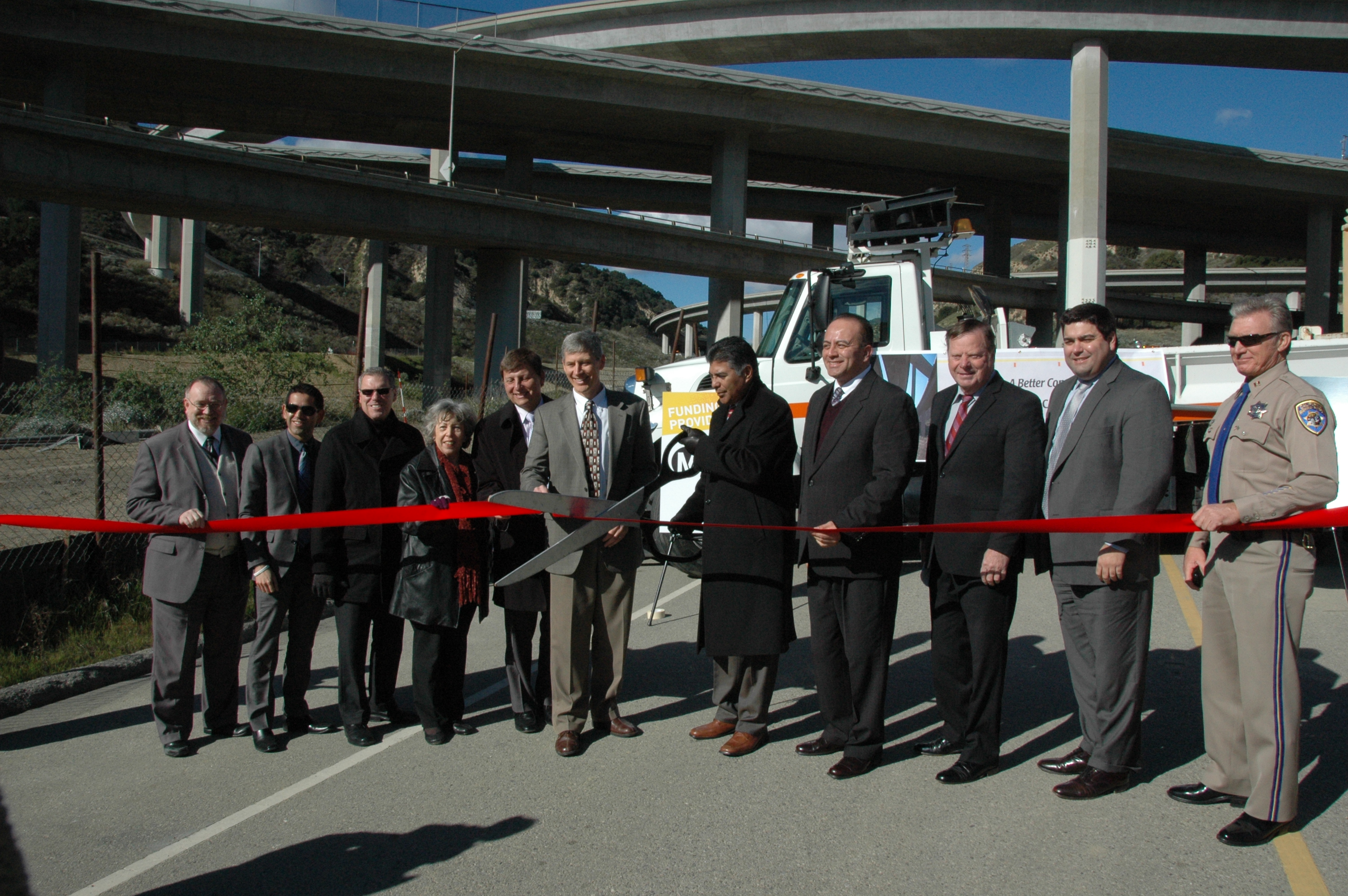 Officials cut the ribbon on the new HOV connector this morning. Rep. Tony Cardenas is holding the scissors. Photos by Luiz Inzunza/Metro.