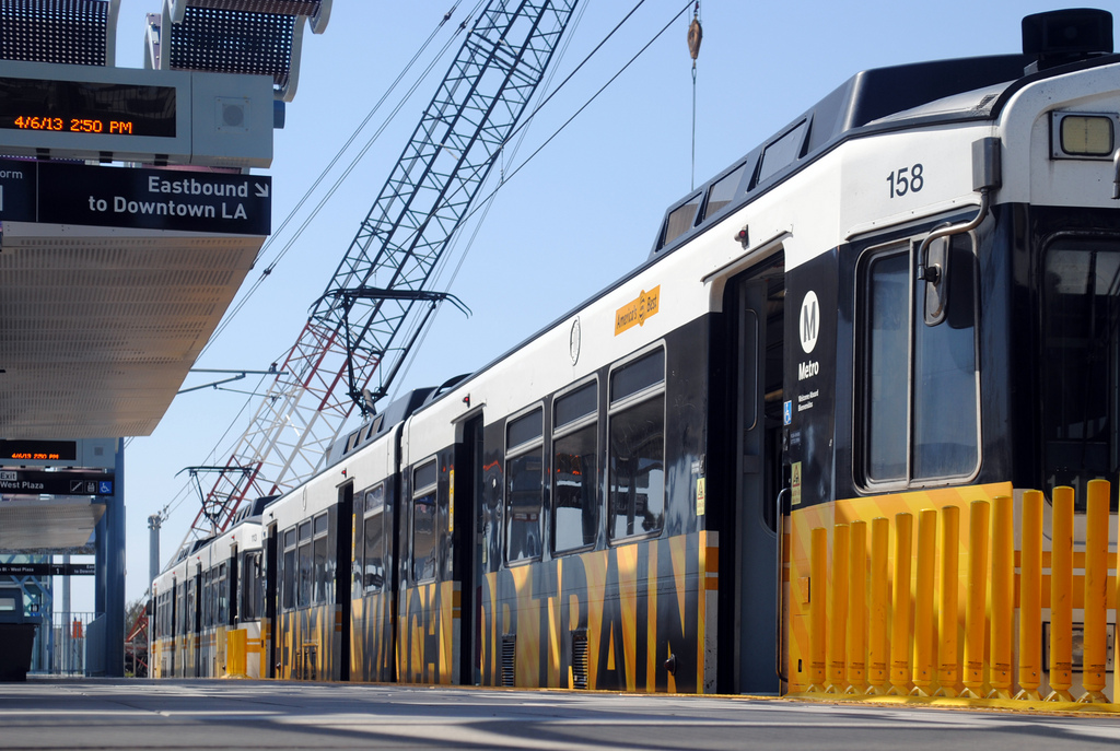 ART OF TRANSIT: Nice shot of an eastbound Expo Line train at Culver City station. The crane in the background is building the bridge that will take the train over Venice Boulevard. Photo by Brian Hsu, via submission.