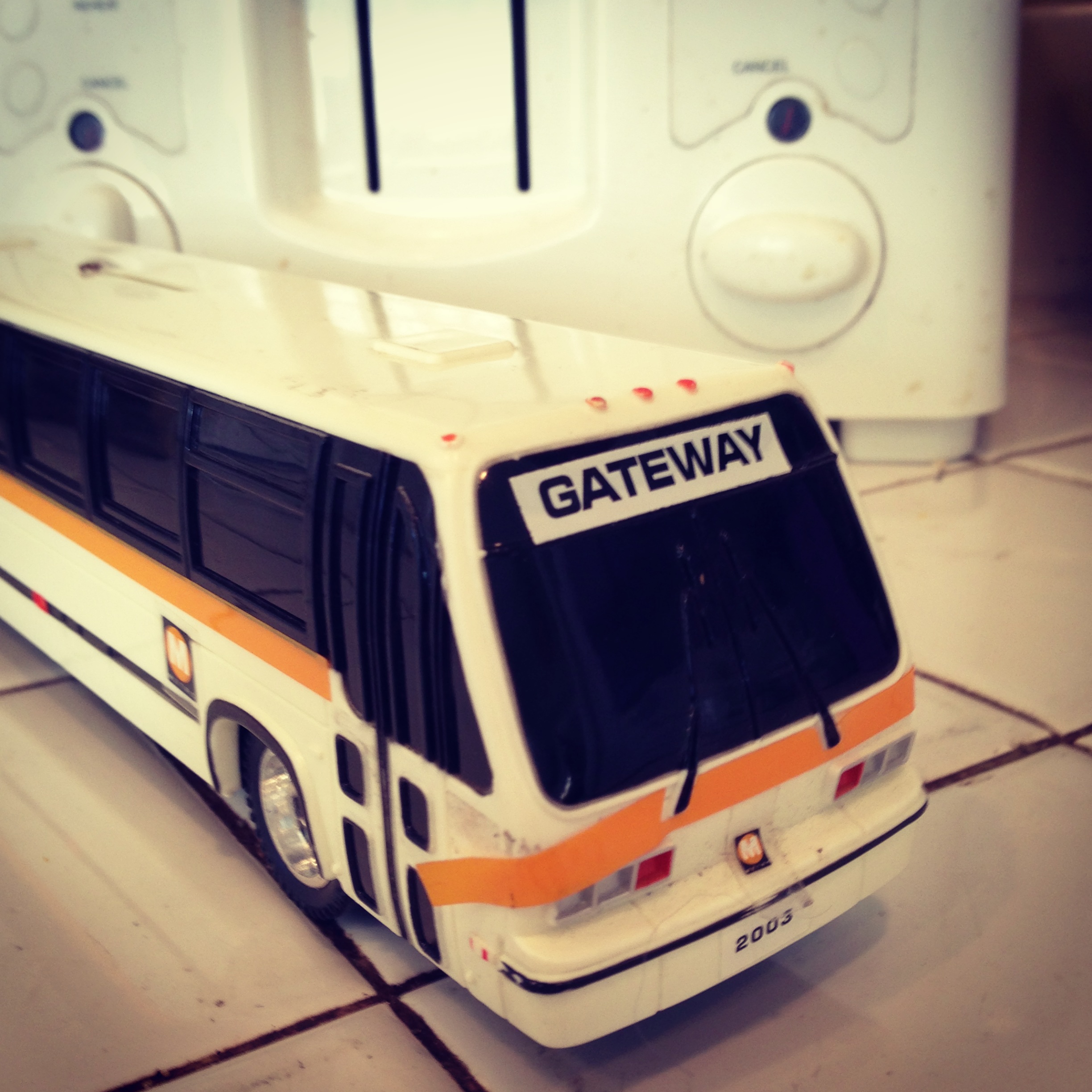 ART OF TRANSIT: My awesome new Metro bus piggy bank navigates the kitchen counter. A friend found this in her office and gifted to yours truly. Prepare yourselves dear readers: giant yellow lab toys with bus photos are just a matter of time. Photo by Steve Hymon/Metro.