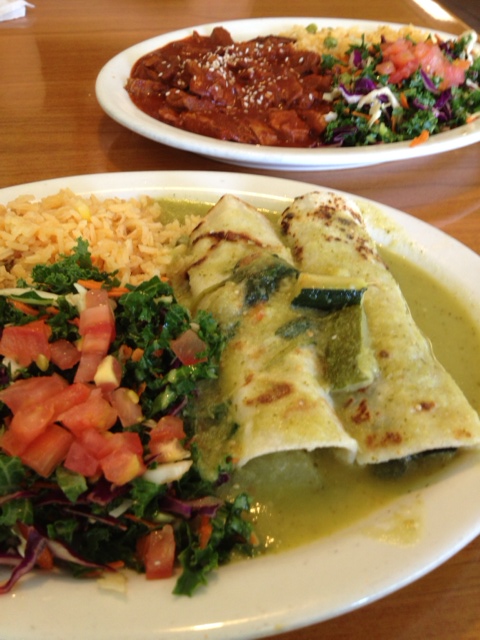 Veggie enchiladas (front) mole plate (back) at Cinnamon in Highland Park.