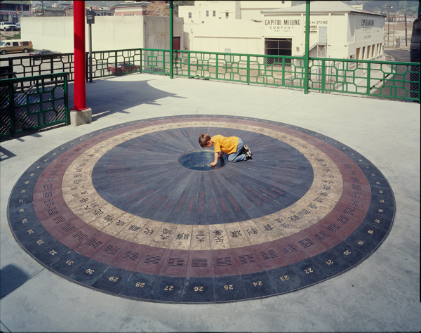 An I-Ching based compass and granite dial on the mezzanine, by Chusien Chang at Chinatown Station. Photo: Metro Creative Services.