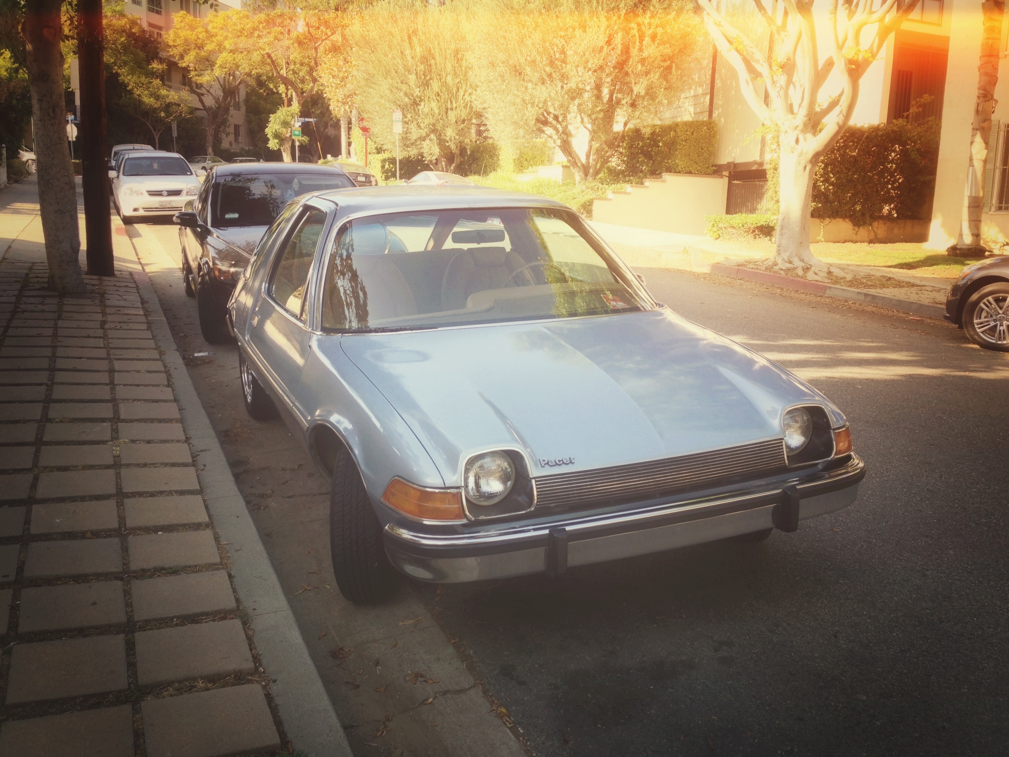 ART OF TRANSIT: You don't see too many AMC Pacers around anymore; I saw this one parked on a local street with an ad in the window offering it for film shoots. Smart! I took the photo with my iPhone and used Snapseed's Retrolux feature to make it look like something shot in the 1970s.