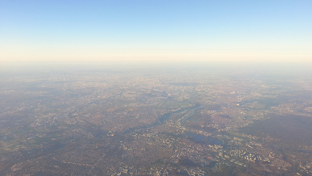 Smog hanging over Paris as seen from an airplane on Sunday. Photo by F.Clerc via Flickr creative commons.