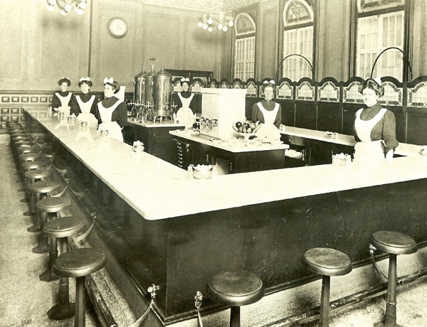 Harvey Girls at the original Dearborn Station in Chicago, before the city had a Union Station. From Appetite for America, courtesy of the Gordon Chappell Collection, Denver Public Library.