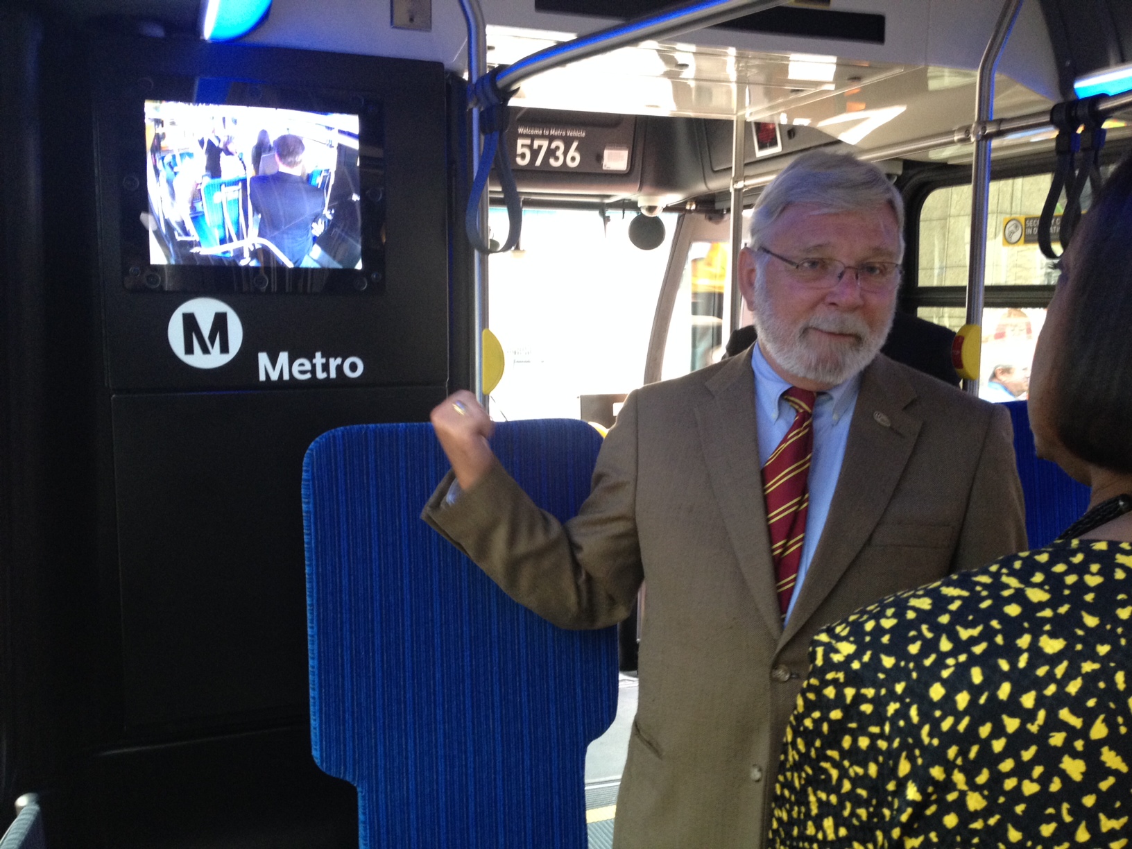 Metro CEO Art Leahy showing the new security video screen on board a Metro bus. Photo: Paul Gonzales/Metro