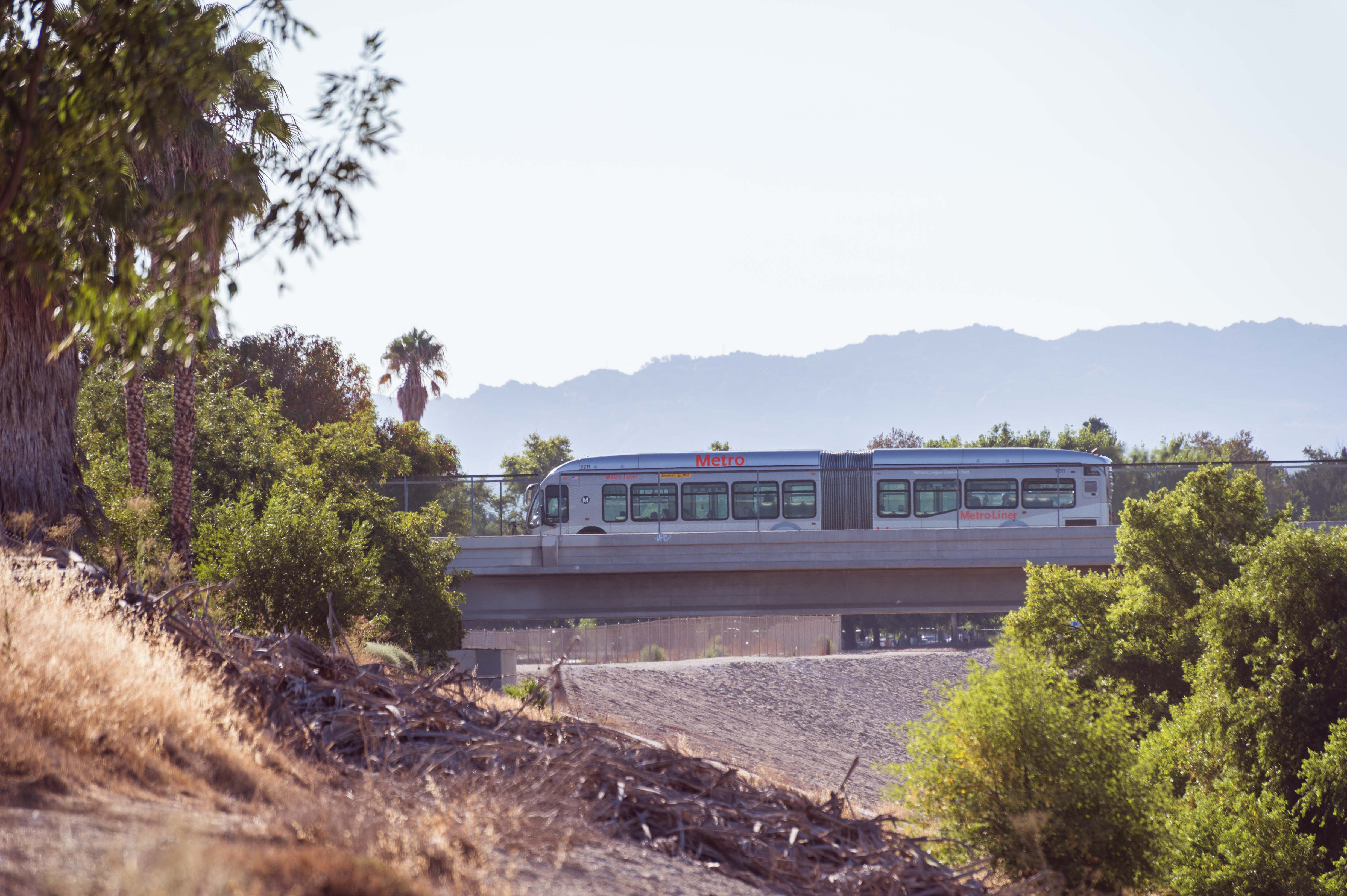 ART OF TRANSIT: The Orange Line crossing the L.A. River in the Sepulveda Basin earlier this week. More Orange Line stock photos free for anyone that needs them on our Flickr site. Just click above. I'll be out shooting some pics along the Eastside Gold Line later today--wave is you're riding by! Photo by Steve Hymon/Metro.
