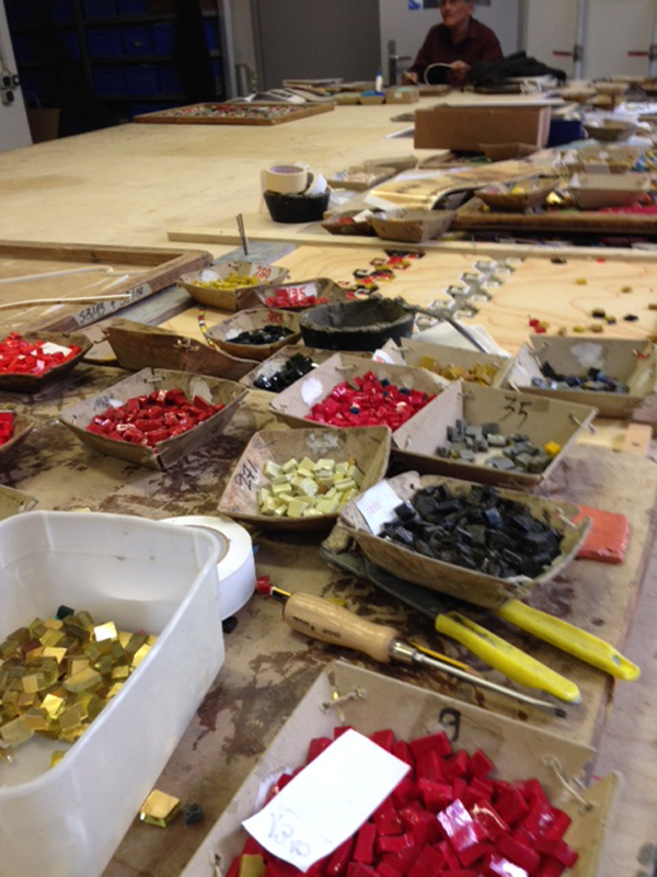 Thousands of tiny mosaic tiles are prepared to handset into ceramic tiles. Photo Credit: Mayer of Munich
