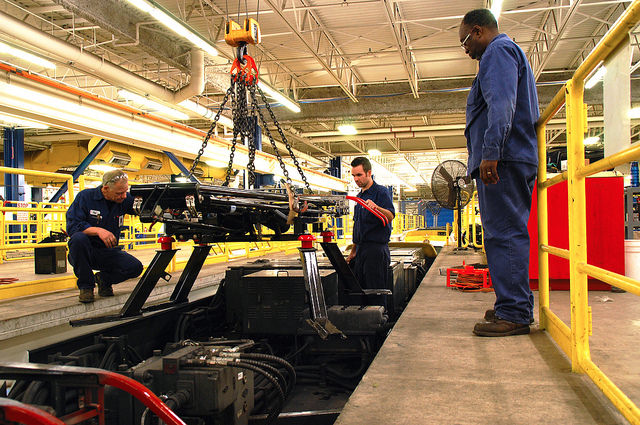 Technicians preparing to install snow-cutter on light-rail vehicle (Photo: Drew Kerr, Metro Transit) via Flickr Creative Commons License