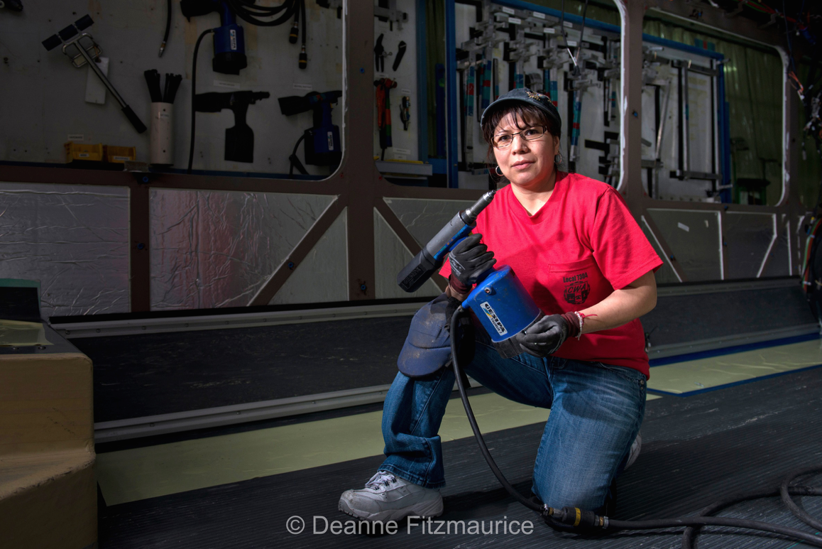 Maria Nunes-Rothstein, an assembly technician at the New Flyer Industries bus factory in St. Cloud, MN.