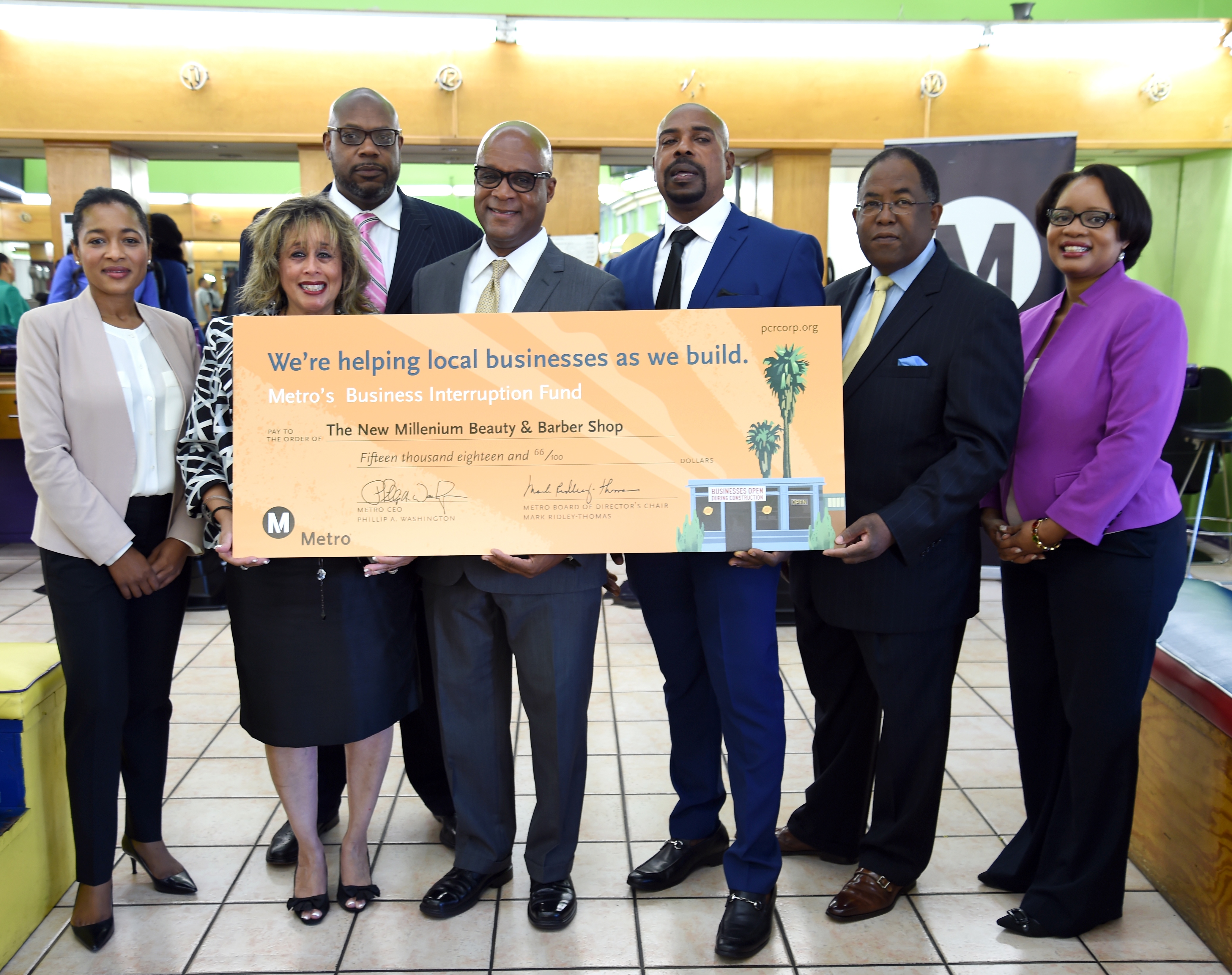 Metro Board Chair and L.A. County Supervisor Mark Ridley-Thomas awarding the most recent business interruption fund check. Photo: Luis Inzunza/Metro
