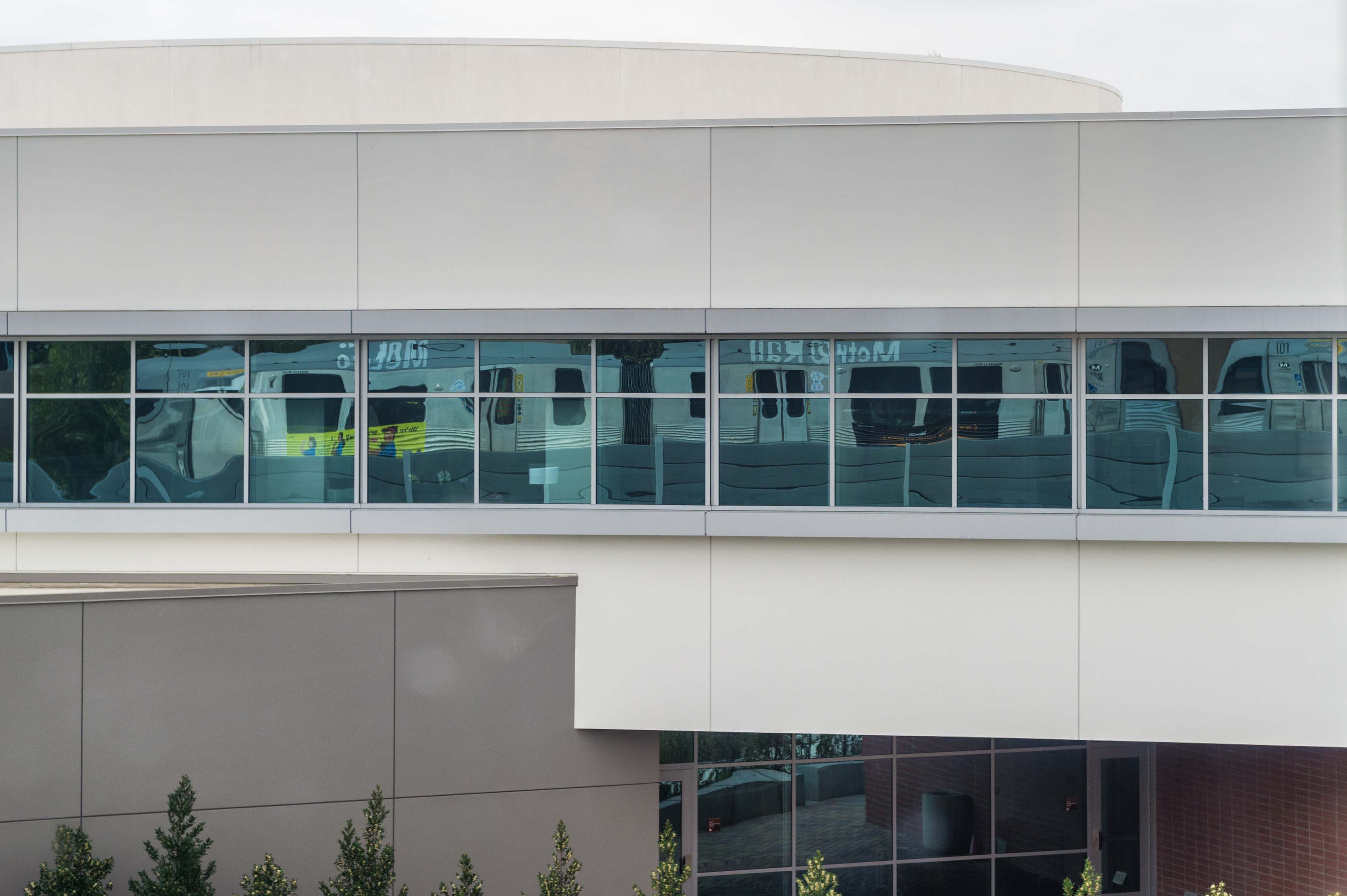 This is a better picture when the sun is shining -- it's the Gold Line's reflection in a building between Arcadia and Monrovia. The building is on the south side of the tracks for you shutterbugs out there. Photo by Steve Hymon/Metro.