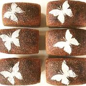 Six loaves with flour butterfly on top