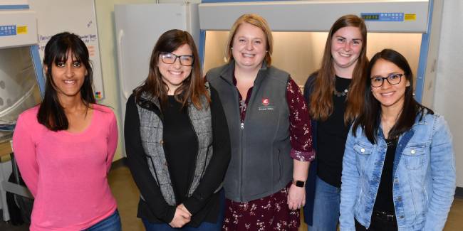 WSU scientists stand together in the BL2 Core Lab