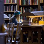 Woman studying in Suzzallo Reading Room