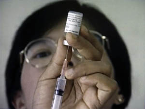 The selective pressure of the Thailand RV 144 vaccine, pictured above, on HIV is also being studied by Mullins and his colleagues./U.S. Army photo