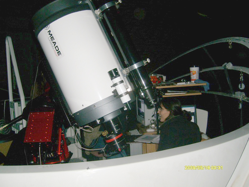 A student astronomer uses the 16 inch Meade 200ACF telescope on the A wing deck of the Physics/Astronomy Building. This is the telescope that the Protostars members would use for their observations.