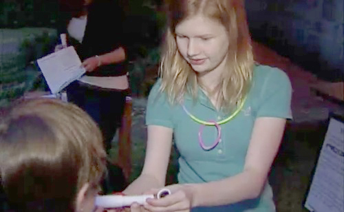 During an observatory open house, Olivia Humes helps people to build mini telescopes which are made out of cardboard and two lenses. They are much like the seafaring telescopes of old.