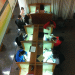 A group of students in a college library Project Information Literacy visited in the last few weeks of a term.