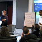 Dr. Mark Snowden, Harborview chief of psychiatry, discusses the implementation of an innovative depression treatment, PEARLS (Program to Encourage Active, Rewarding Lives), with a group of administrators.