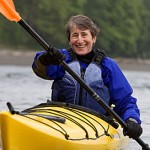 Sally Jewell paddles a kayak.