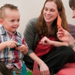 A toddler takes part in early intervention activities at the UW Autism Center.