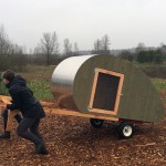 moving a new chicken coop at uw farm.