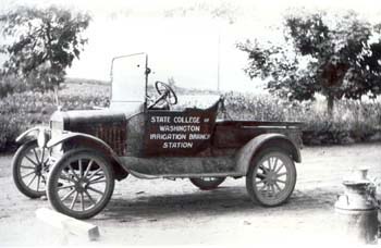 Black and white photo of old car