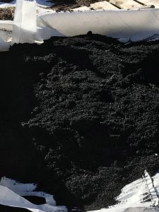 Tarp bag filled with biochar