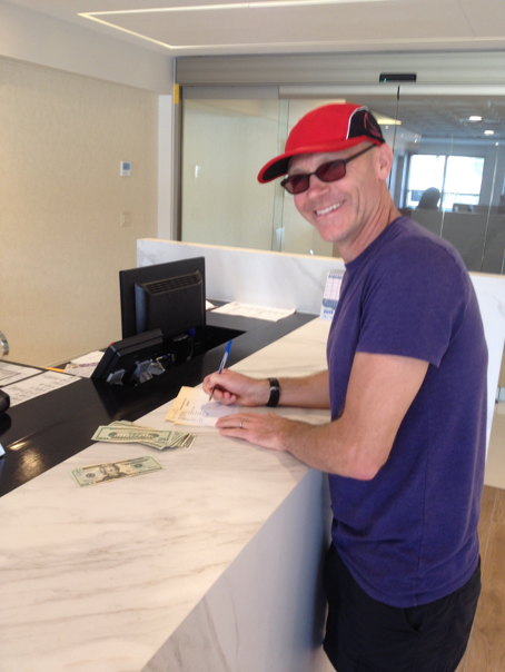 Collecting my $150 at the Garza Blanca Resort