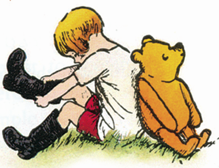 Winnie-the-Pooh bear and Christopher Robin back to back as Christopher pulls on black boots