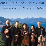classical musicians in front of italian coast