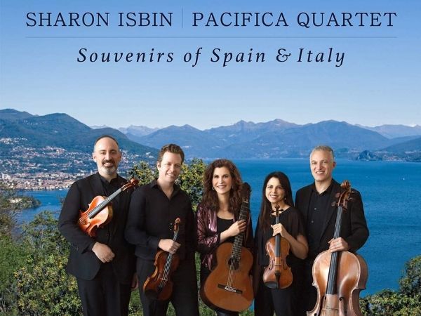 classical musicians in front of italian coast