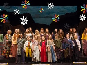childrens chorus on stage singing